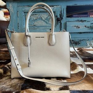 Slightly used Michael Kors bag & Micheal Kors RENEW and PROTECT cleaners